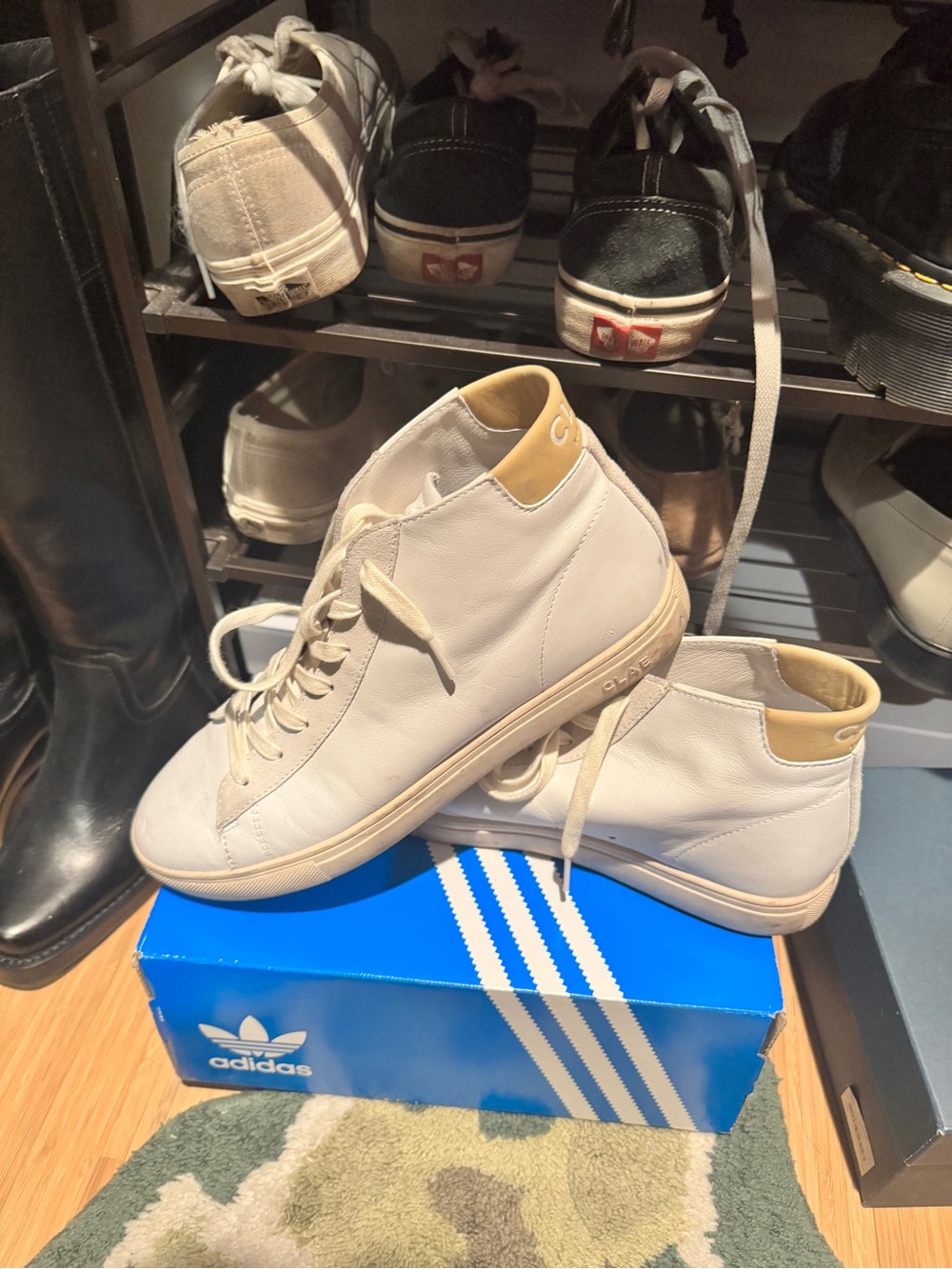 Good condition Clae Bradley mid leather sneakers size 9